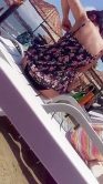 Sexy girl with bikini undressing at beach