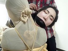 Tied Together With Her Humiliated Victim