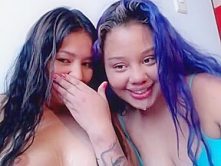 Two girls spitting and gagging on toys