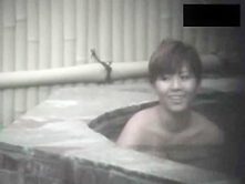 2 asian japanese ladies relax in outdoor public bath