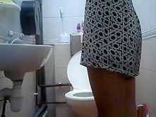 Asian girl with hairy pussy caught peeing