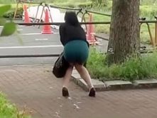 Beautiful Asian girl accidentally pisses in publi