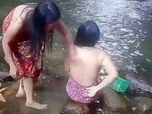 Beautiful girls having bath outdoor