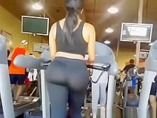 Big ass woman in tight sports pants at gym