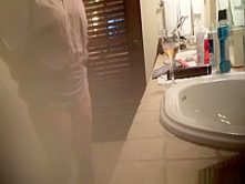 Big tits milf smoking and drinking in bathroom