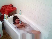 Big tittied college slut Aylie takes a bath