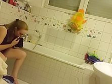 Chubby girl spied in bathroom peeing and washing pussy