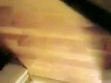 Drunken blonde coed throws things at the camera while trying to pee