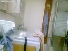 Hairy wife spied in bathroom after shower