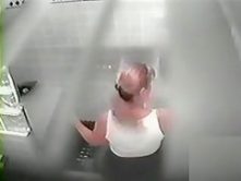 Hidden cam shows a curvy woman showering