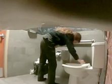 Hidden camera pissing clips from a public toilet