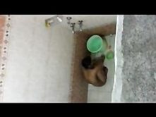 Indian girl taking a bath in hotel room