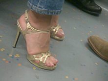 MILF in golden high heels