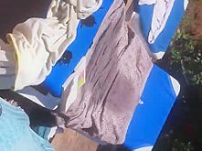 sexy ass brunette sunbathing