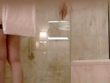 Small boobs woman spied taking shower