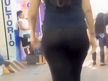 Teen in black see through leggings