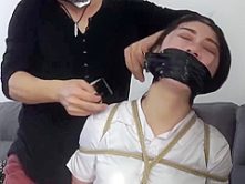 Two Asian Beauties Bound In Leather Pants
