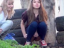 Voyeur spying girls pissing outdoor
