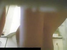 Woman caught by bathroom spy camera