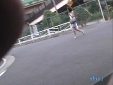 Asian girl makes her short even shorter than before