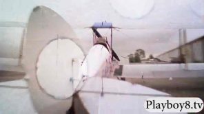 Beautiful babes flying a biplane for the first time
