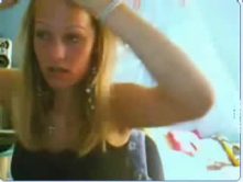 Blonde chick flashing her boobs and pussy on webcam