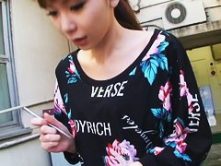 Confused Japanese girl shows her entire chest to a spy cam