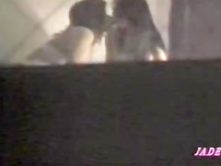 Cute Asian Sapphic sluts in window voyeur sex scene
