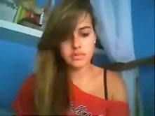 girl flashes her small tits and rubs her shaved pussy standup