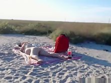 Nudist girl sucks off her bf, while her milf is sun bathing.