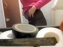 Pissing lady caught by a spy cam