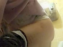 Russian woman caught peeing
