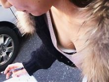 Sweet sexy babe is reading some paper and shows her boobies