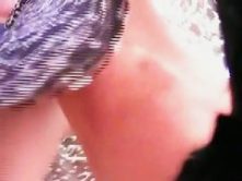 Up skirt voyeur clip of a redhead teen flashing her tight ass in public